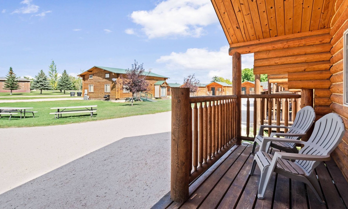 St. Charles Cabin | Rustic camping studio with large front porch & kitchenette