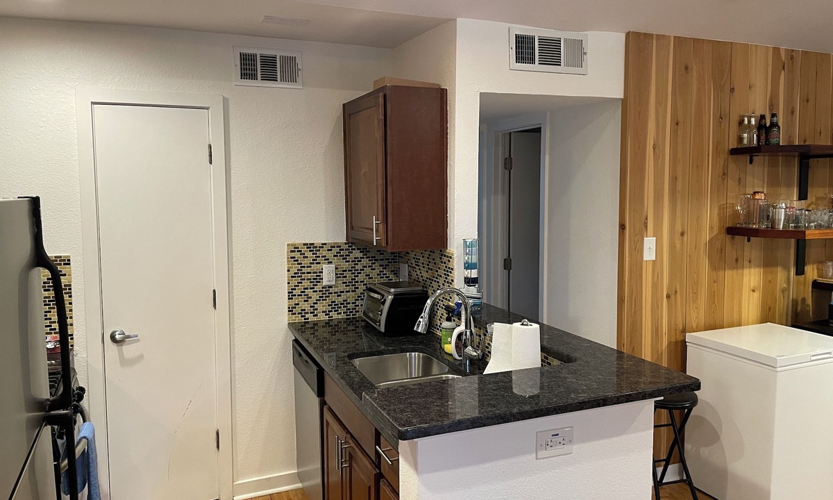 South Lamar Condo | Rustic Pool Front Condo with AC, High Speed Wifi in Beautiful Austin, TX