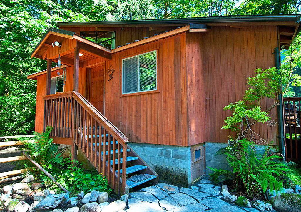Baring Cabin | Rustic River Paradise w Hot Tub & Mountain Views! Pet Friendly!