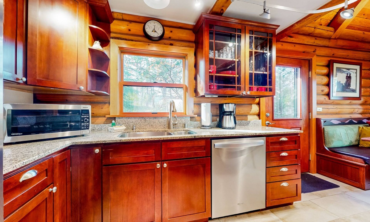 Oak Harbor Ski Chalet | Rustic waterview home, covered deck, vaulted ceilings & updated kitchen