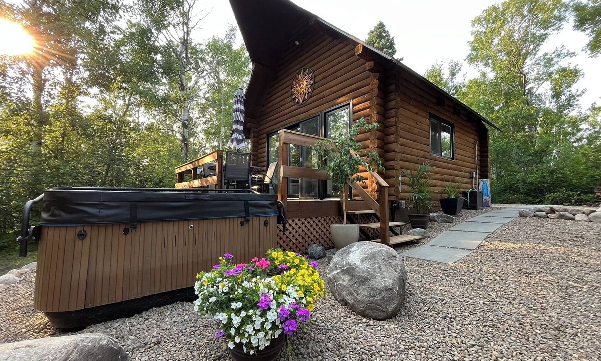 Onanole Cabin | Sand Lake Log Cabin with Hot Tub