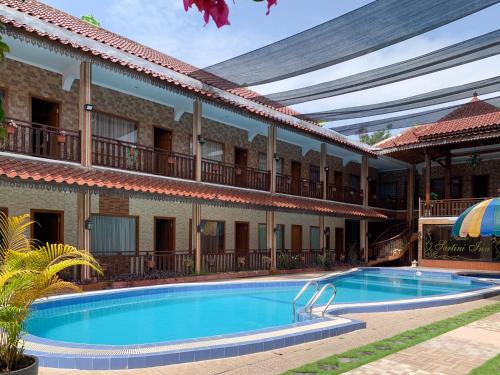 Depok Hotel | SANS Vibes Sartini Inn Yogyakarta