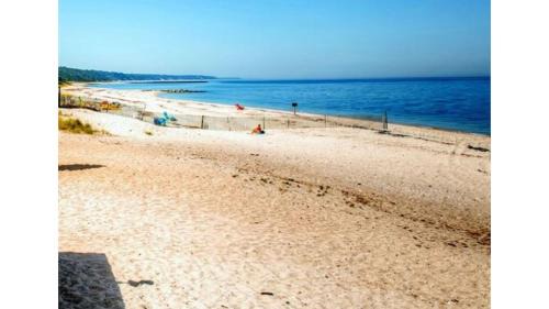 Wading River House | Seaside Stay: Waterfront with Views & Beach Access