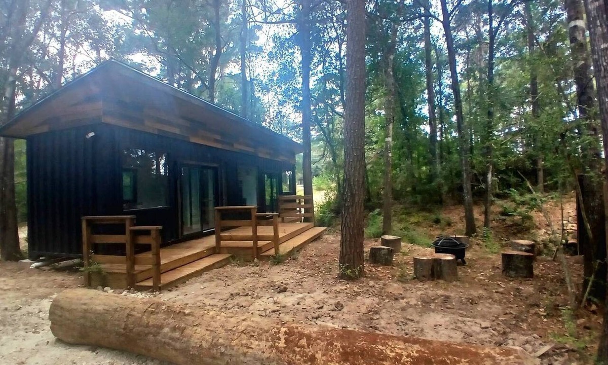 Plantersville Cabin | Secluded Container with BBQ for a Waterfront Retreat, Perfect for Fishing and Roasting S'Mores in Grimes County, Texas
