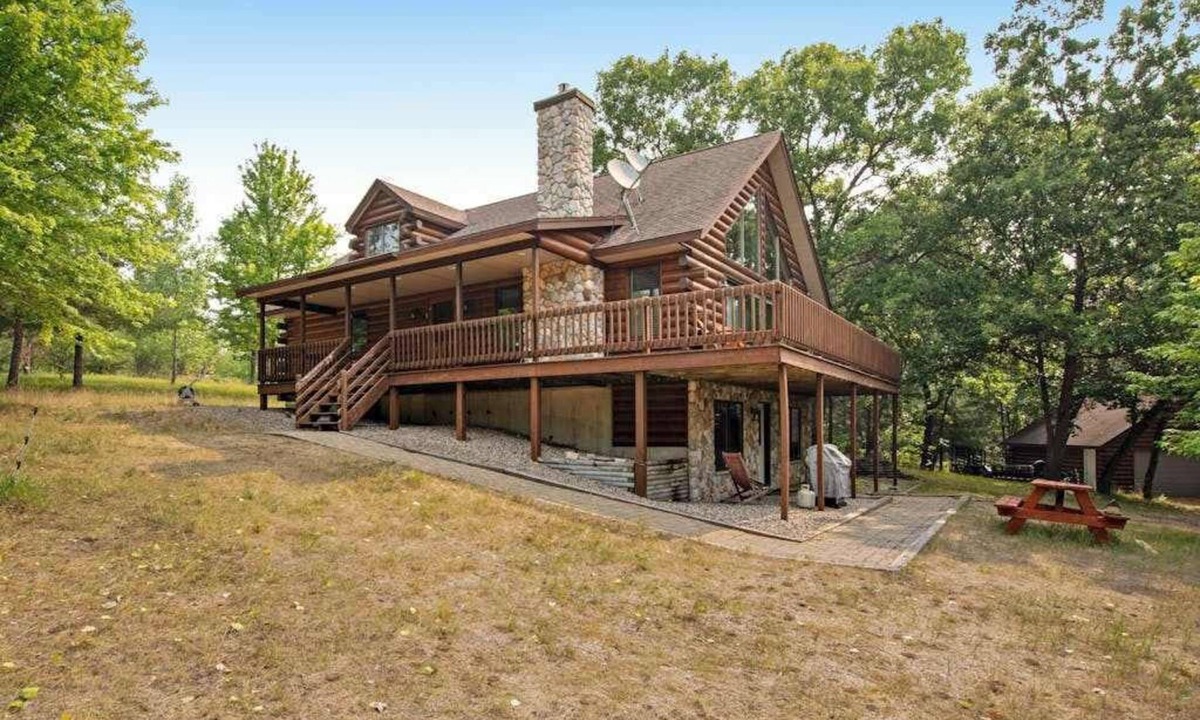 Friendship House | Secluded, dog-friendly home with tree-lined view, firepit, fireplace, & deck