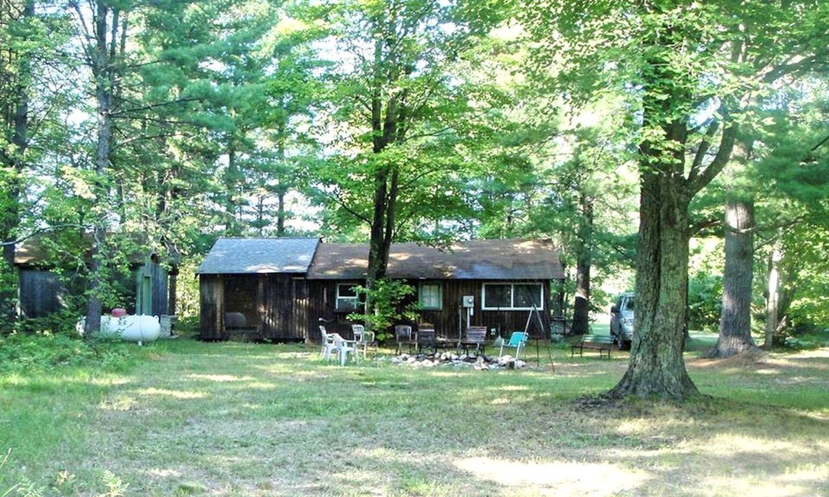 Dickson Township House | Secluded Rustic Cabin Rental Inside Manistee National Forest in Brethren, Michigan