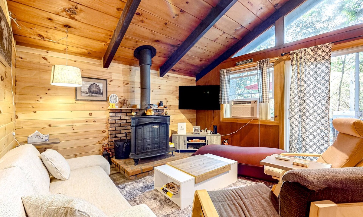 Center Conway House | Secluded, rustic, dog-friendly home with firepit, deck & woodstove