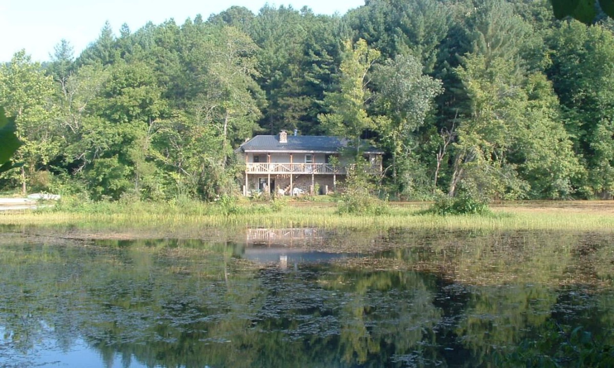 Salem House | Secluded Stone Housen50' deck overlooking Beaver Lake on Ozark Mushroom Farm!