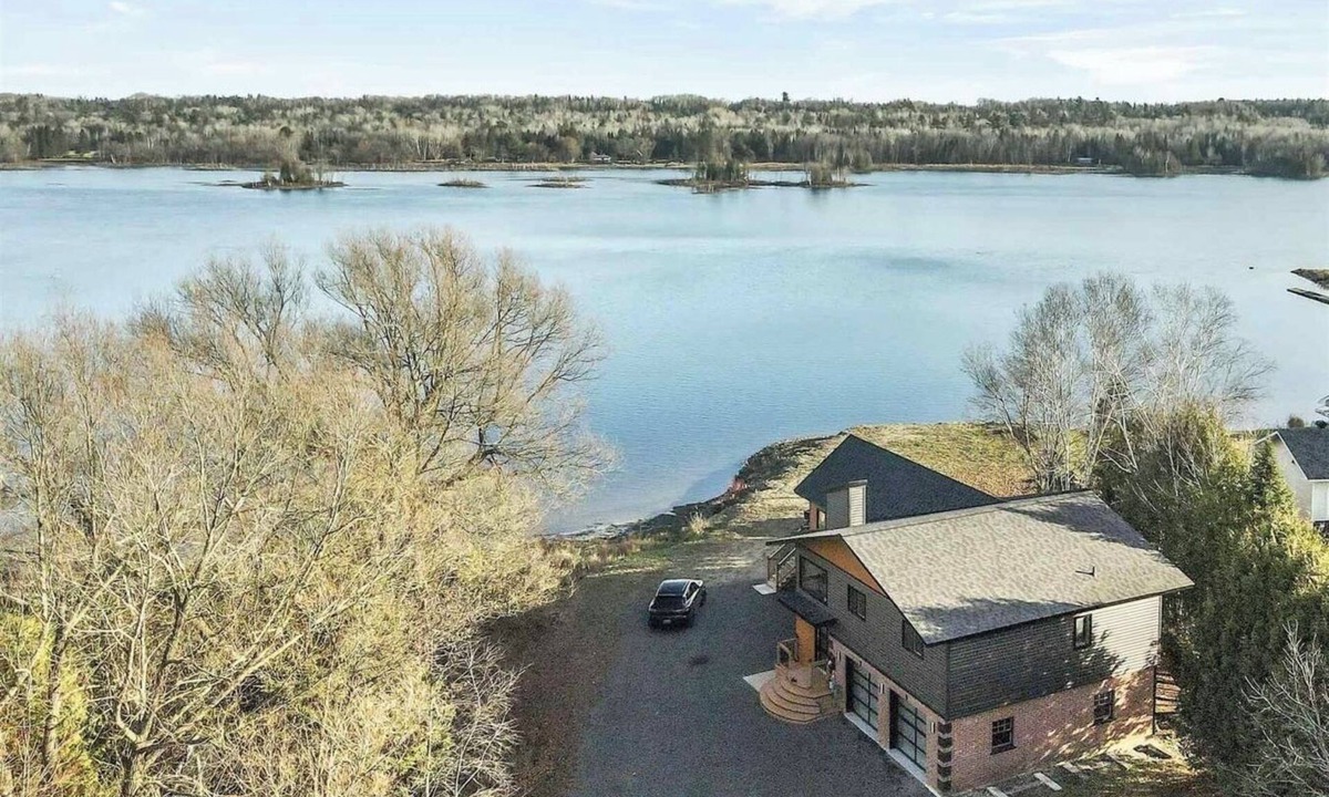 Sault Ste. Marie House | Secluded waterfront modern home | Lake access, Deck, BBQ, Firepit | Pet friendly