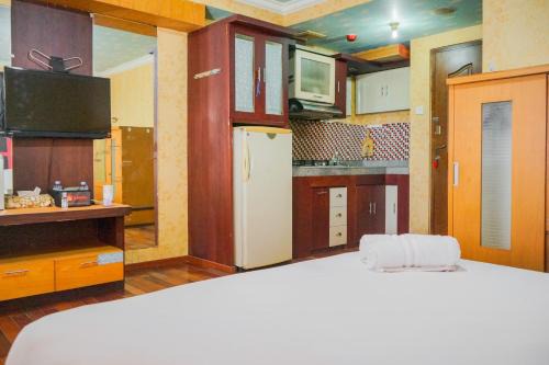 Panunggangan Utara Apartment | Simple and Minimalist Studio Apartment at Great Western Resort By Travelio
