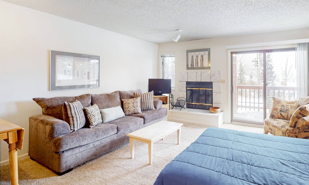 Winter Park Apartment | Simple & Lovely Studio with Wood Fireplace, WiFi & Mountain View Balcony