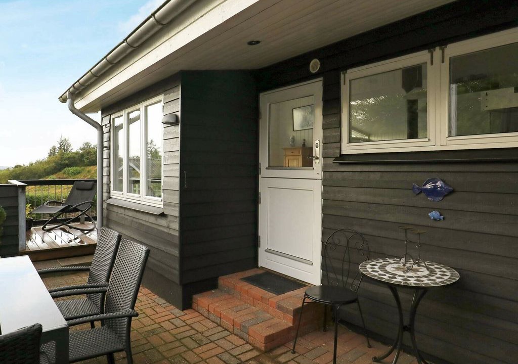 Hjarbæk House | Simplistic Holiday Home in Løgstrup with Terrace