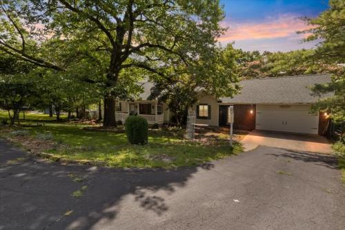 Osage Beach House | Six Suites with Hot Tubs, Private Jacuzzi Baths, Wooded Garden and Lake Access with Boat Slip