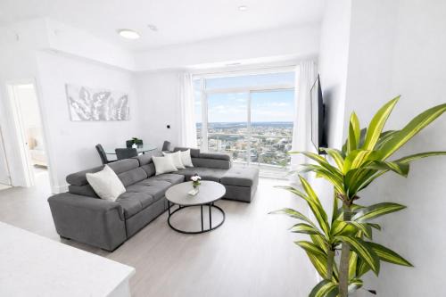Kitchener Apartment | Skyline Luxury Suite Floor to Ceiling Views King Bed Balcony