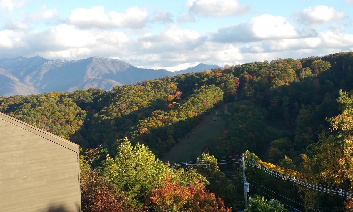 Chalet Village Condo | Sleep on a mtn top above the clouds! Gorgeous views, hot tubs suana king bed!