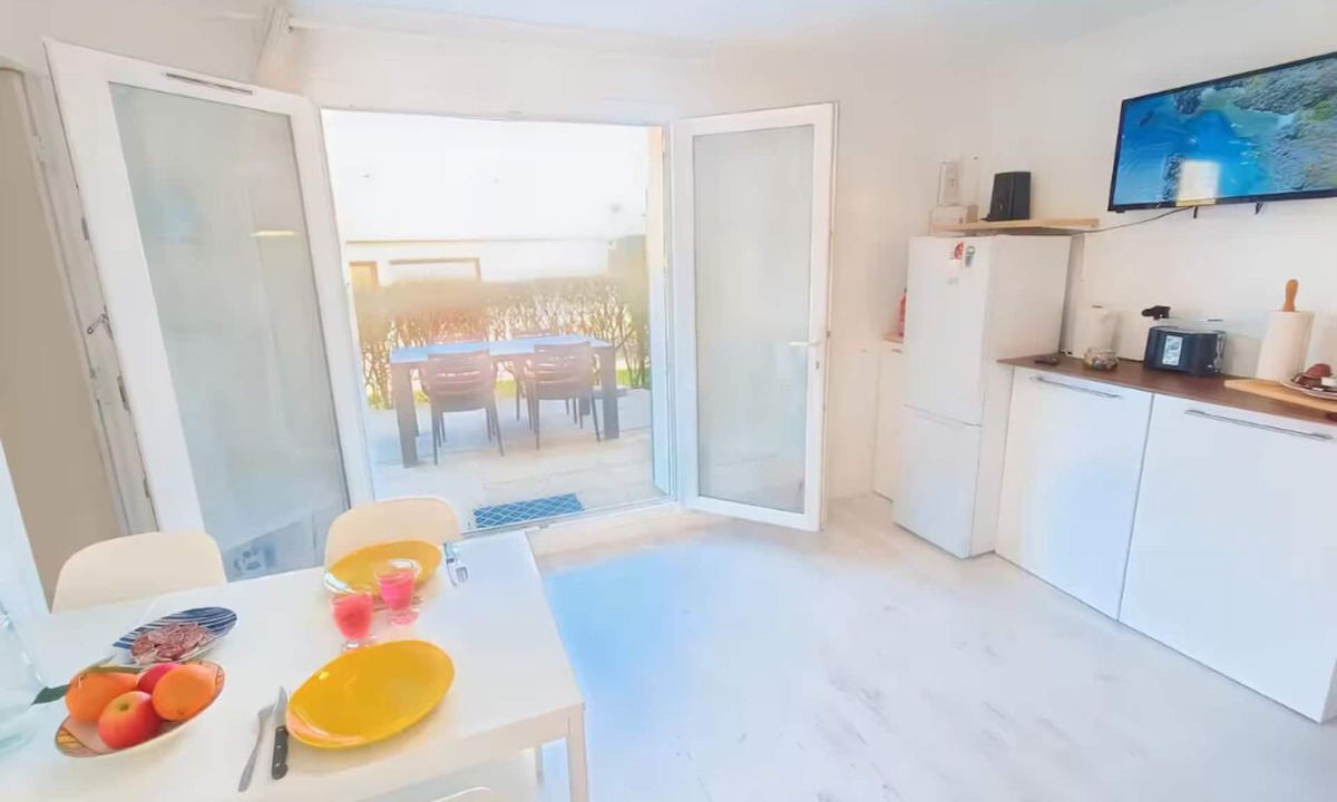 Merville-Franceville-Plage Apartment | Small private courtyard - 1 minute walk from the beach