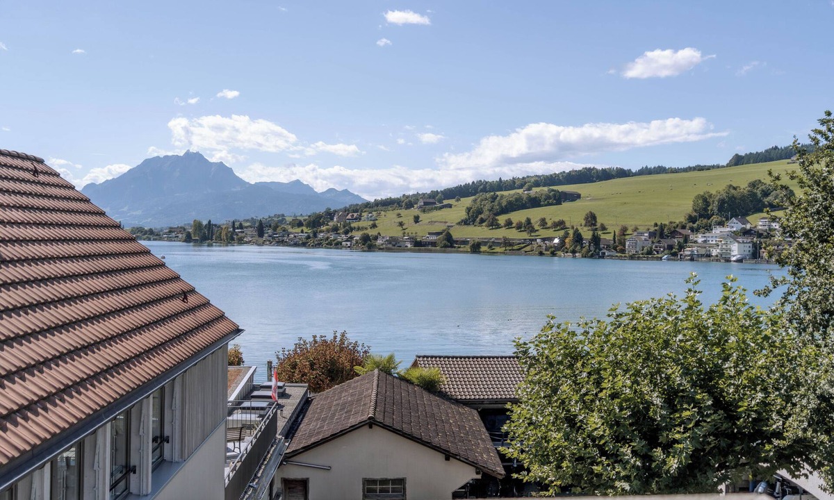 Kuessnacht Apartment | SolunaStay Lakefront Penthouse | Lucerne | Swiss Alps | Pilatus | Sunsets