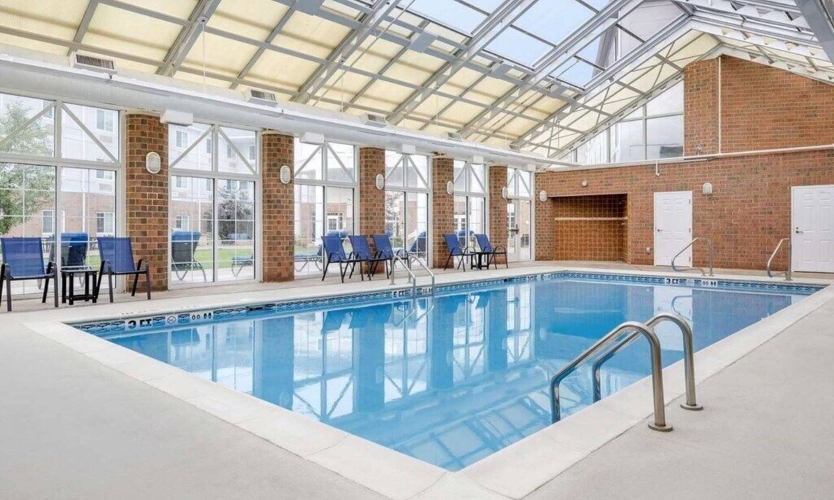 Mishawaka Villa | South Bend | Fan Basecamp | Pool + Hot Tub