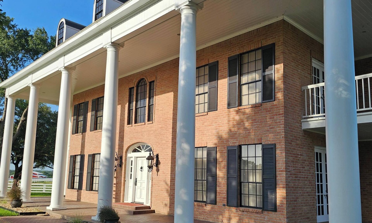 Bellville House | Southern Colonial 2 1/2 story home with a swimming pool, fire pit, ect.