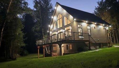 Amherst Ski Chalet | Spa & Relaxation at Lake Cameron - BORD DE L'EAU