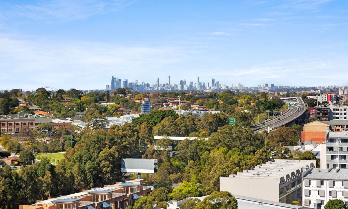Homebush Apartment | Spacious 2-Bed: Rooftop Views, Near Olympic Park