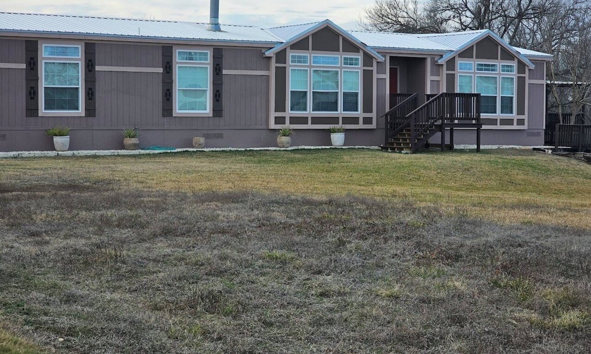 Bellville House | Spacious 4-bedroom Foremans ranch house on a 150 acre ranch with a deck/full gym