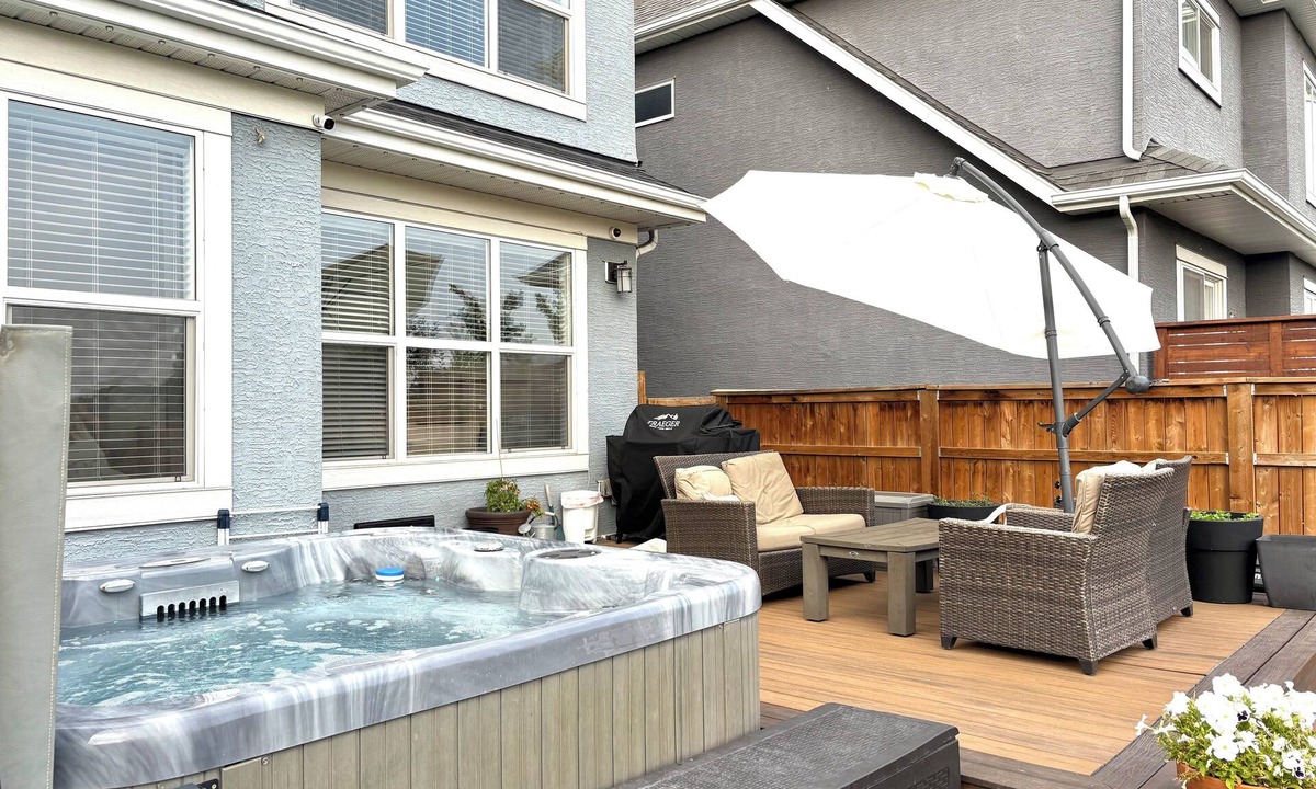 Southeast Calgary House | Spacious 5BR Retreat w/Hot Tub, Fire Pit, Gym & Movie Room