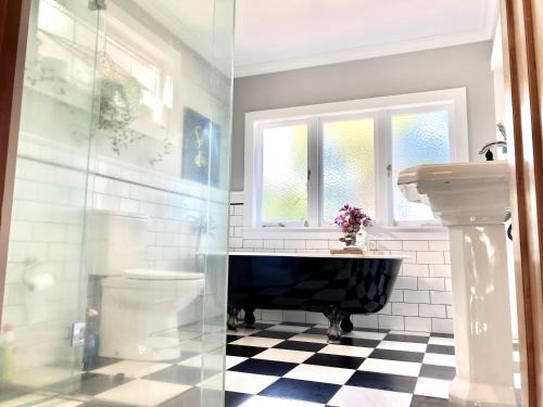 Mount Albert House | Spacious and Sunny Master Bedroom with shared bathrooms