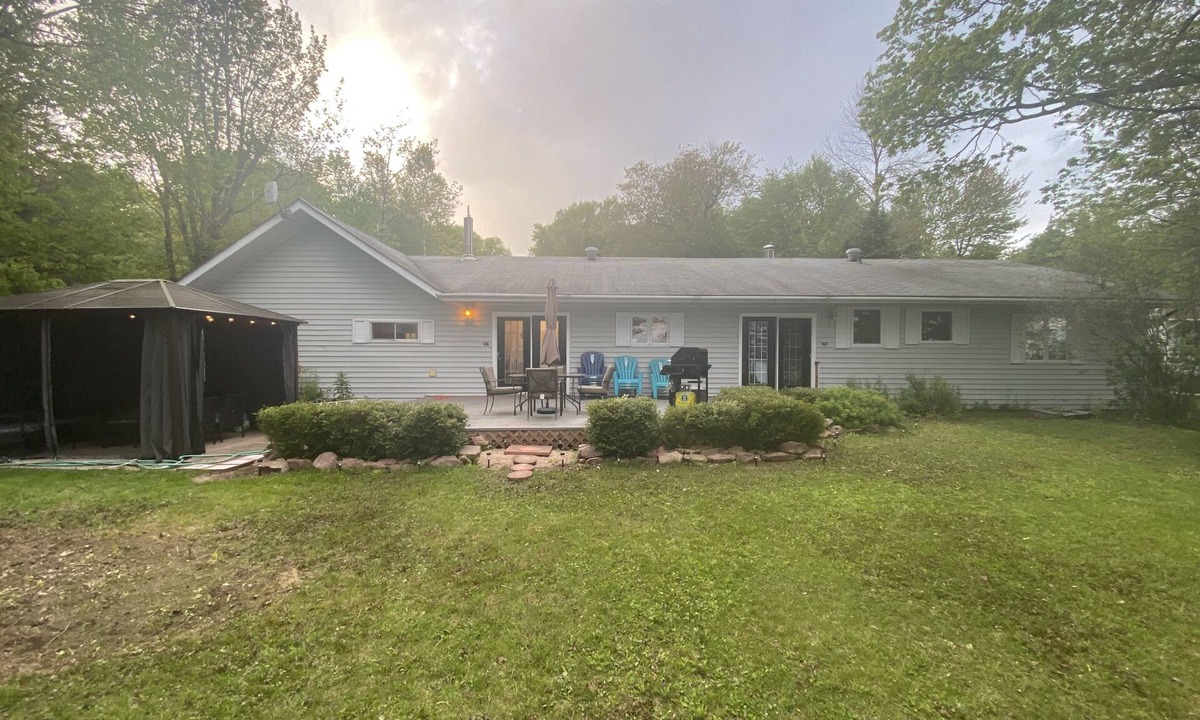 Jocelyn Cottage | Spacious Cottage On Lake with Beach, Fire Pit, Kayaks, Pedal Boat & More!