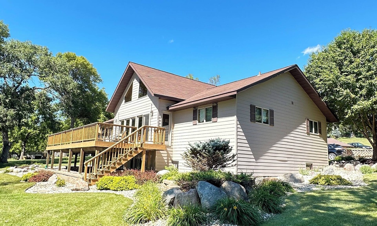 Ortonville House | Spacious home with a large deck and ample space for beautiful sunset viewing!