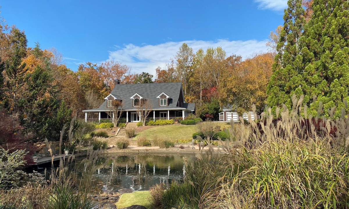 Flowery Branch House | Spacious Lake Front Home with beautiful Gardens, Pond, Waterfall, Pool, & Dock