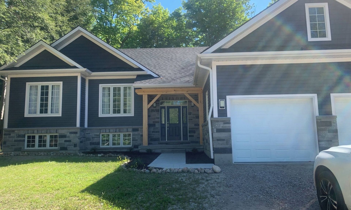 Lafontaine House | Spacious & Modern Bungalow on Cul-de-Sac: Large Deck, Wood Lot, Steps to Beach