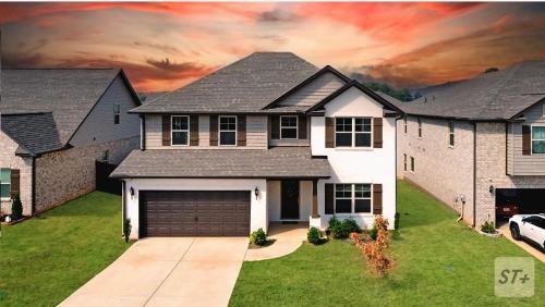 Normal House | Spacious Modern Retreat Near Downtown EV