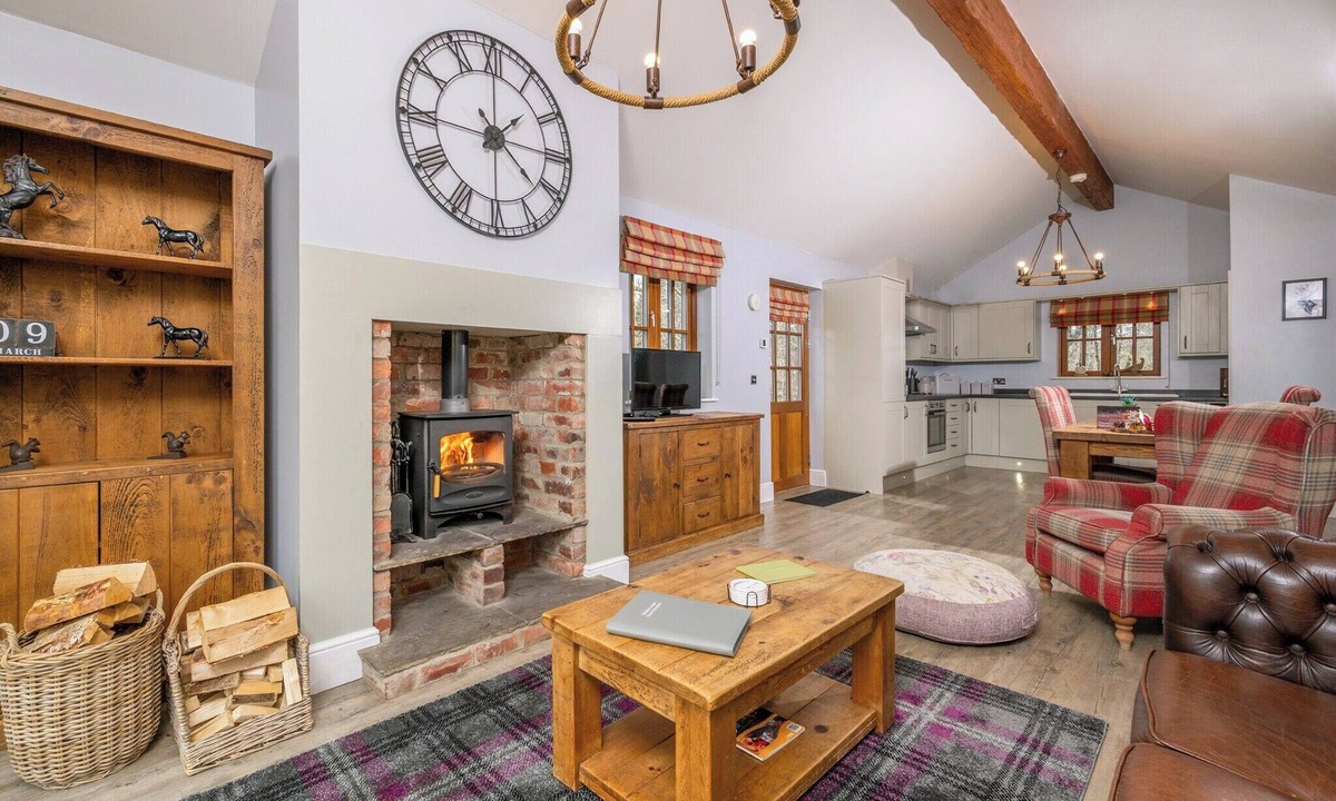 Whitebridge Ski Chalet | Spacious riverside lodge with mountain views.