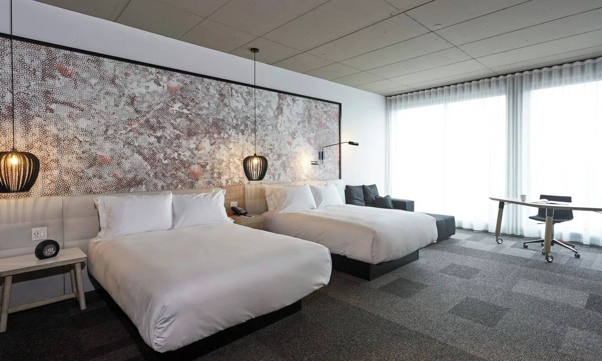 Brossard Hotel | Spacious Room Ideal for Families Near Kid-Friendly Attractions & Dining Options