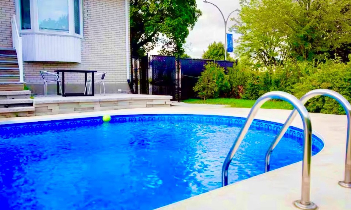 Sainte-Dorothee Apartment | Spacious Zen Floor in Laval - Private Heated & Salt Pool, Garden & Piano