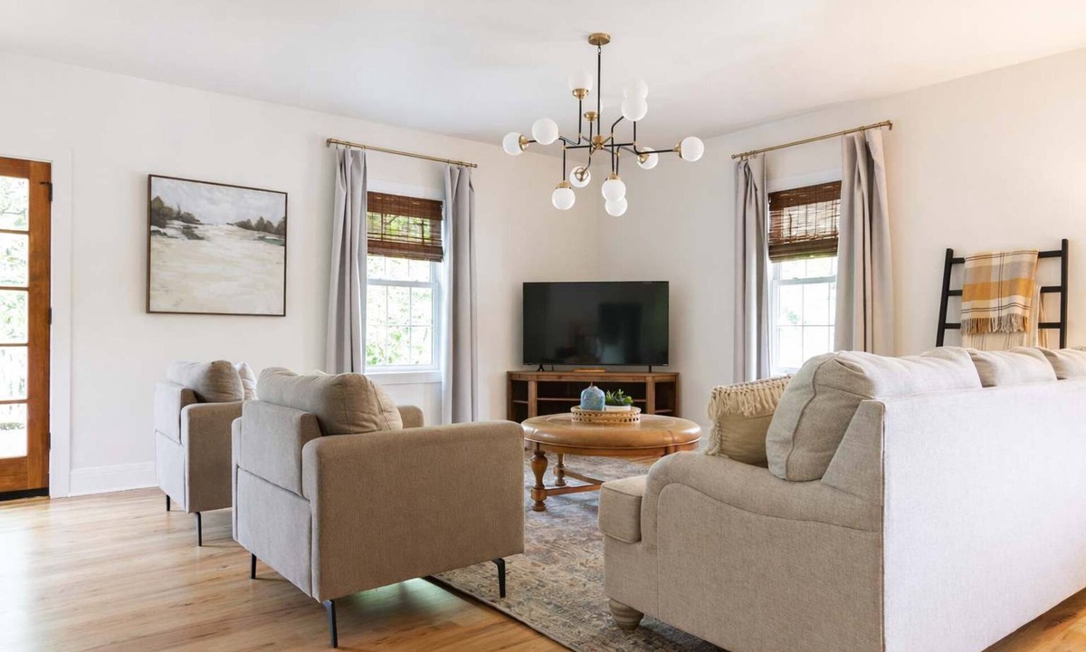 Southwest Raleigh House | Speakeasy Family Retreat with Skyline Views