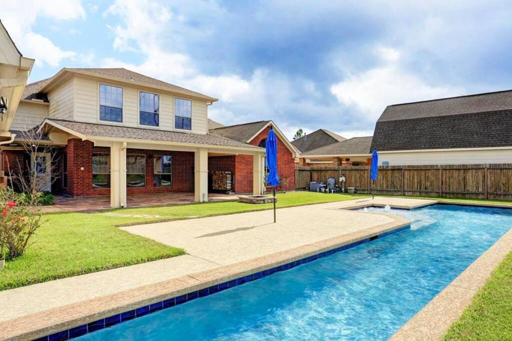 Manvel House | Spectacular Home with A Private Pool & BBQ Grill!