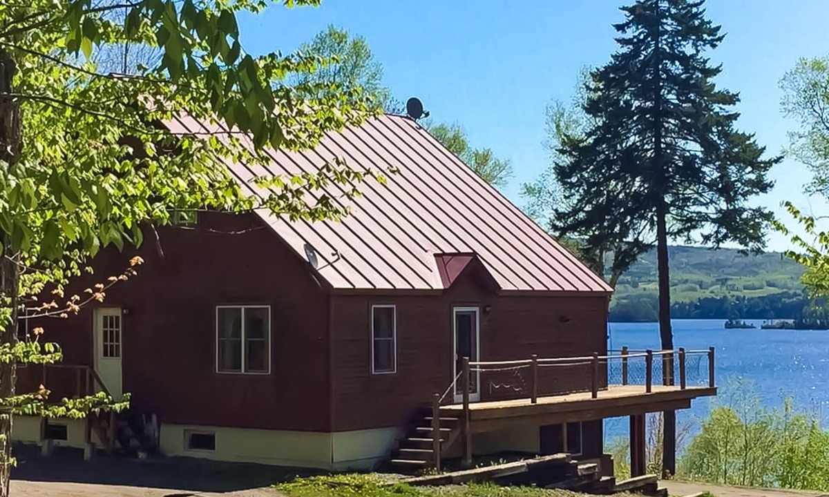 Greenville Junction House | Spectacular lakefront home with dock, firepit, & vaulted ceilings - dog-friendly