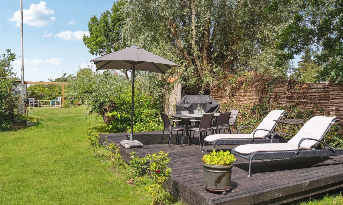 Vejlby Fed House | Spend a wonderful vacation in this comfortable cottage overlooking the sea from the property.