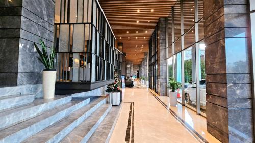 Pinang Apartment | Springwood At By LiviRooms Tangerang