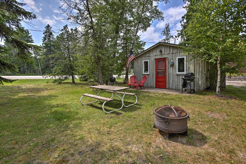 Suttons Bay House | Steps to Beach! Dog-Friendly Suttons Bay Cottage