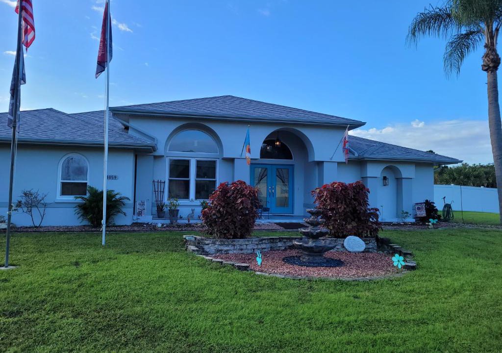 North Port House | steve and cori's tropical king suite 2