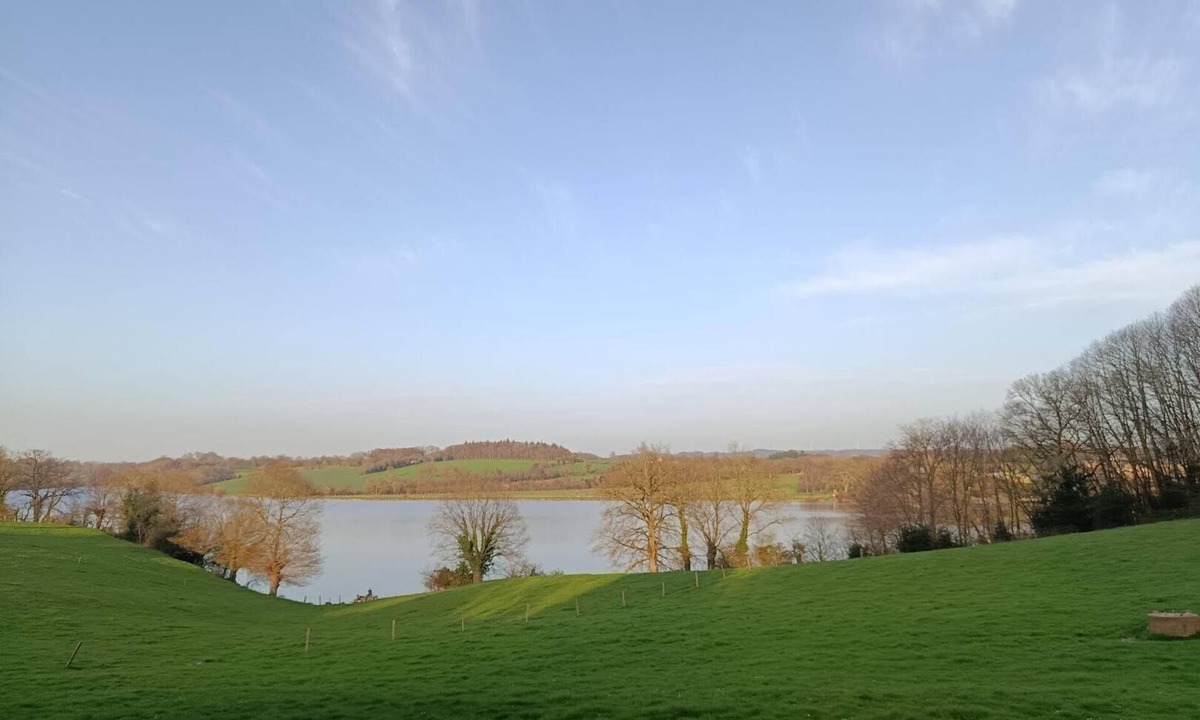 Saint-Fraimbault-de-Prieres Cottage | Stone house with lake view, fireplace, surrounding grassland
