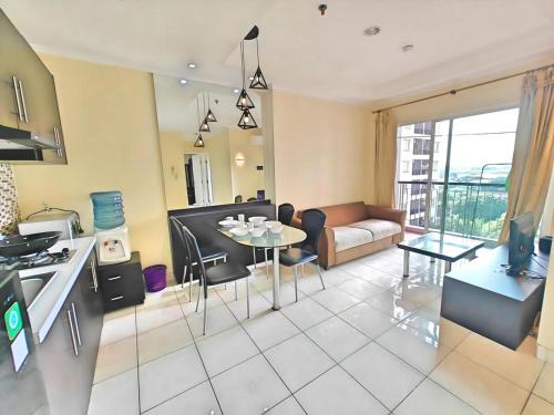 Kelapa Gading Barat Apartment | Strategic 2BR Gading MOI Apt with Wi-Fi, Pool & Gym by 2ndHome