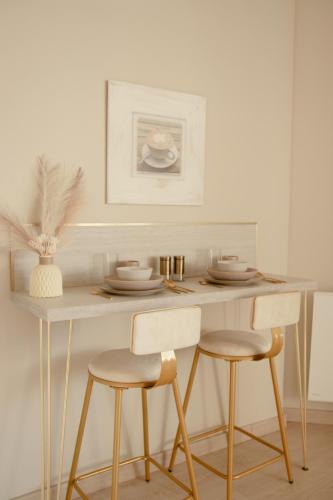 Homecourt Apartment | Studio meublé Le Refuge doré avec Netflix