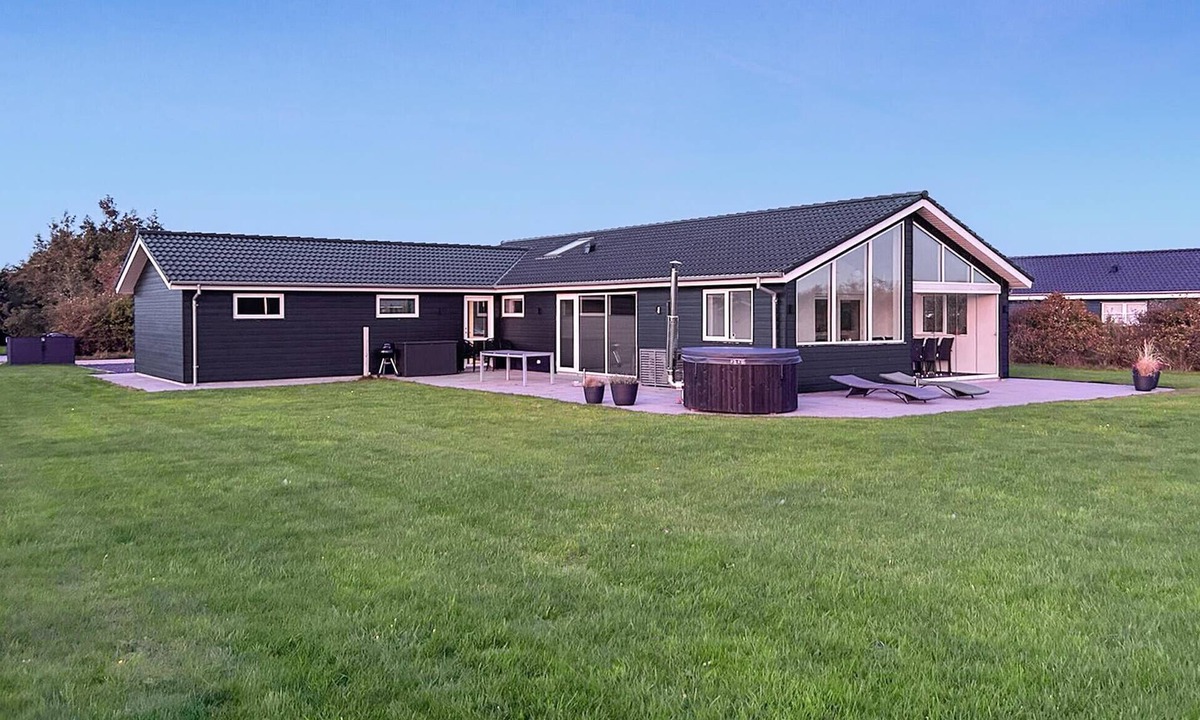Skaven Strand House | Stunning home in Tarm with lake view