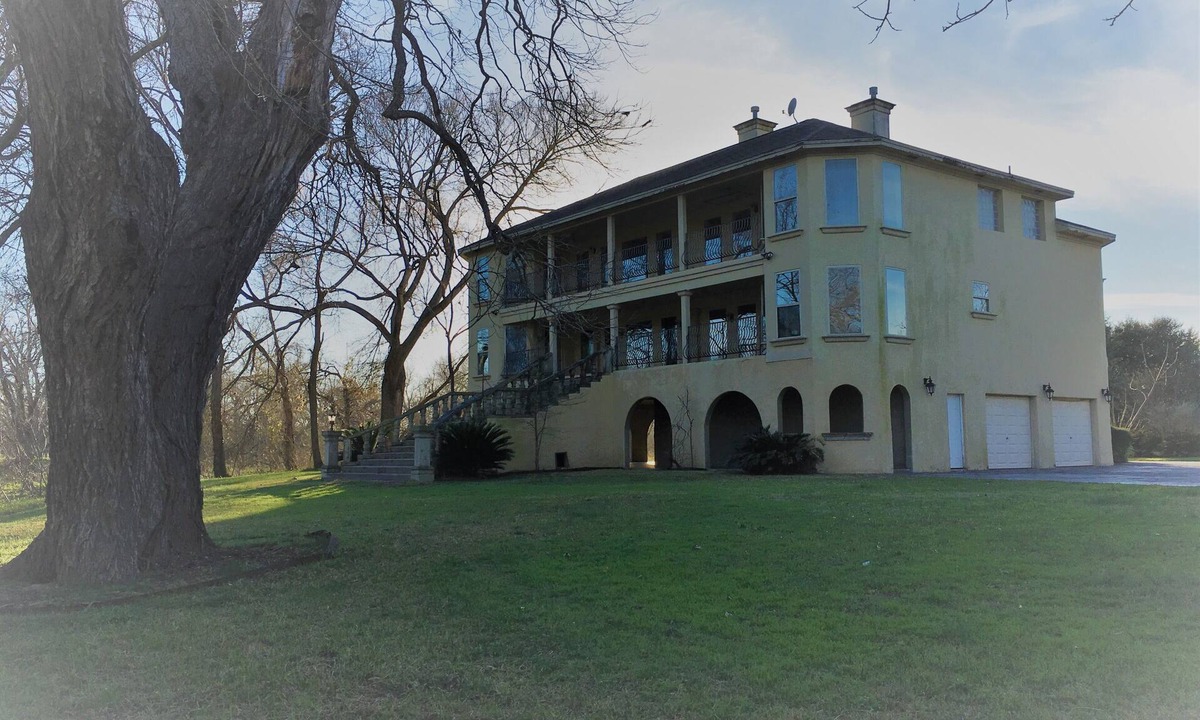 Seguin House | Stunning Mediterranean Style Home on the Guadalupe River in Downtown Seguin