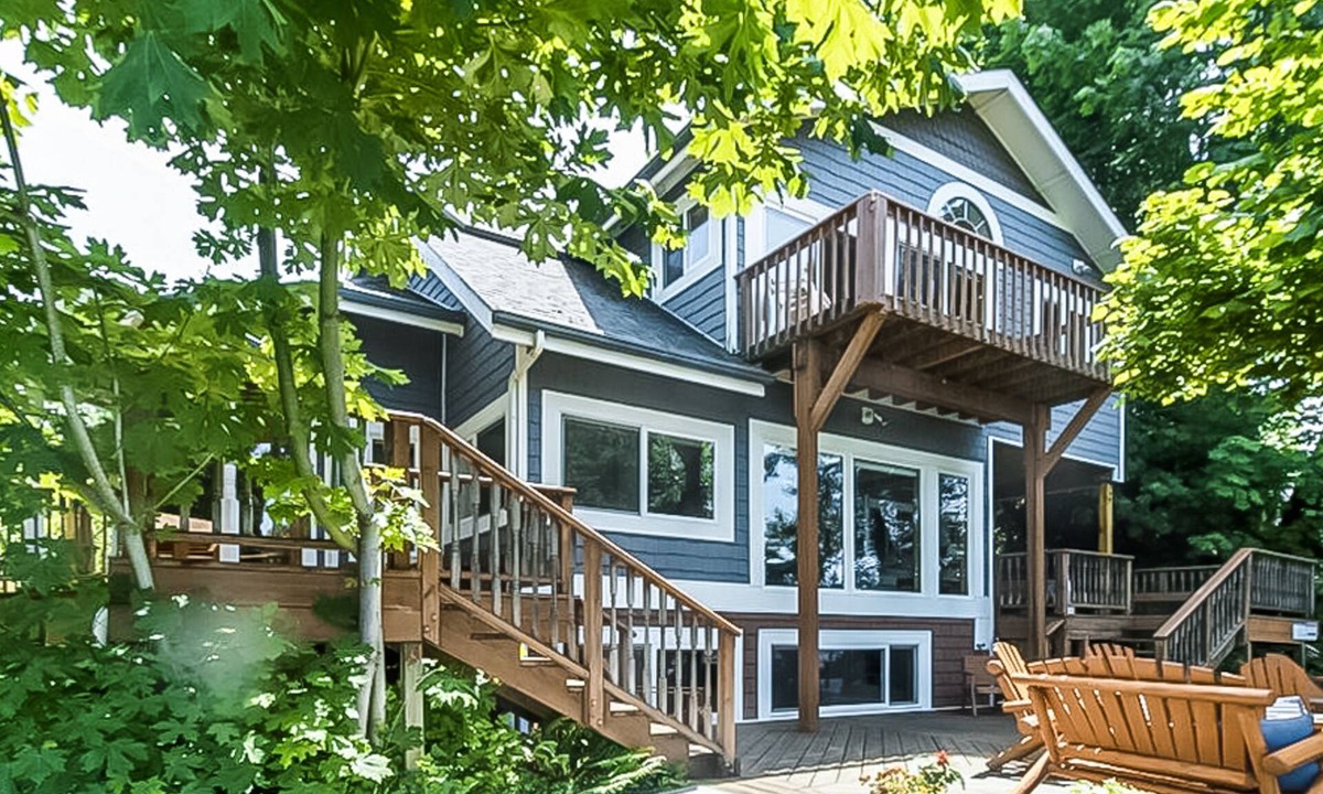 Oak Grove House | Stunning riverfront home w/ spacious deck, grill, two kitchens, & private dock