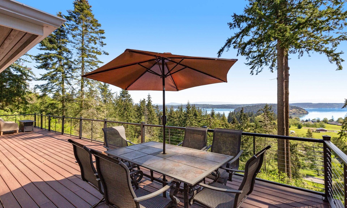 Oak Harbor House | Stunningly situated home with expansive deck & mountain/water views